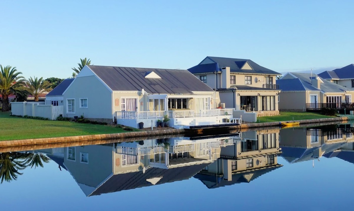 Waterfront homes along a canal with docks